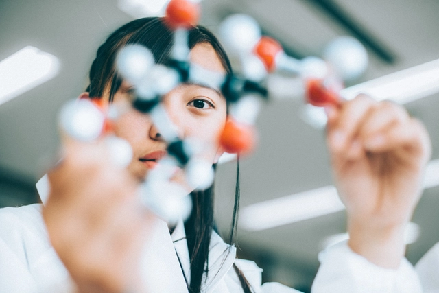 High school student working on her research to publish her paper