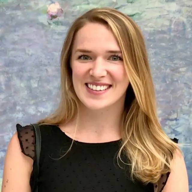 Smiling student with gray background