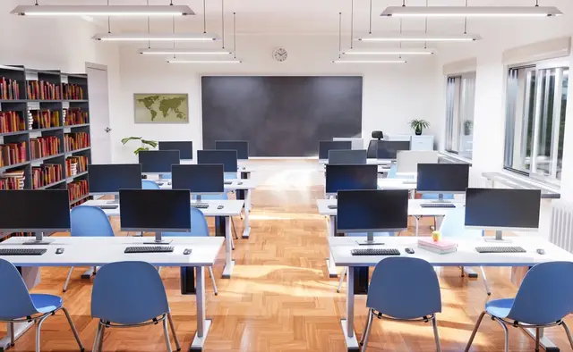 classroom with computers at the desks