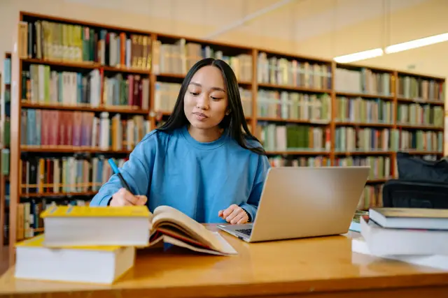 Girl studying in the library