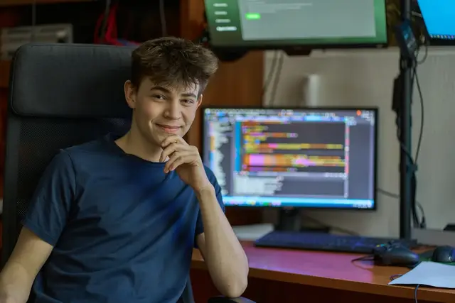 Young student learning computer science