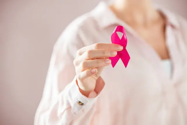How Do Genomic Alterations Impact Gene Expression and Cell Proliferation in Breast Cancer Clones?