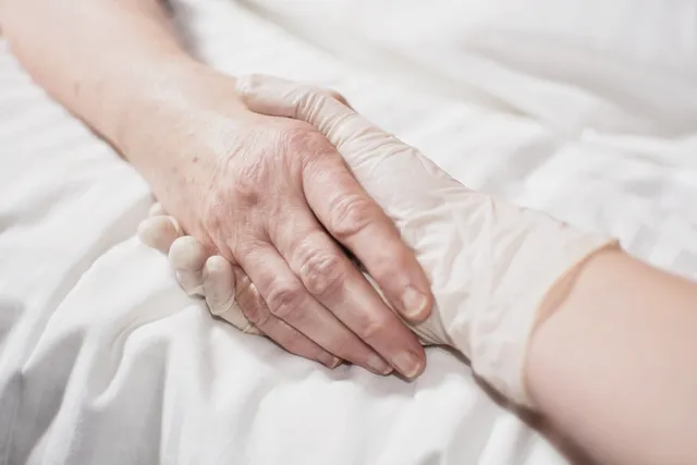 To what extent do theories of personal identity support or oppose the execution of advance euthanasia directives for patients experiencing severe cognitive impairment?